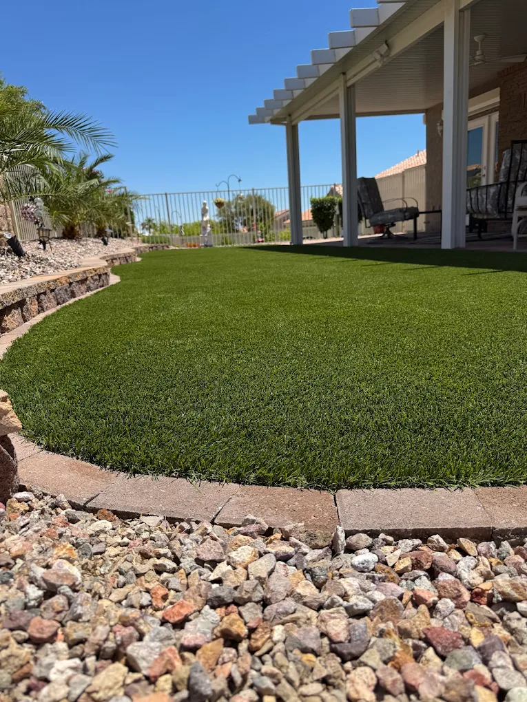 San Diego backyard with artificial turf, pergola, and gravel landscaping suitable for a cat enclosure