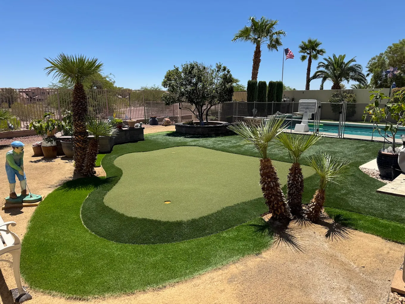 Putting green next to a pool area in San Diego